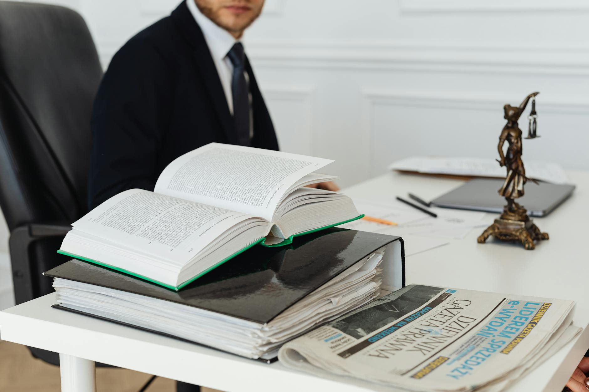 book and binder on a desk